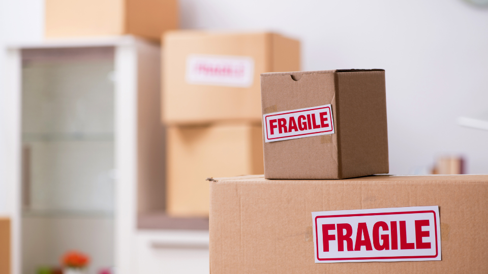 a picture of the boxes with fragile sign