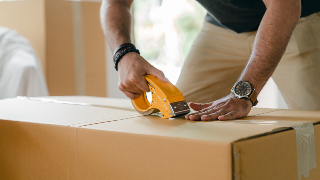 a picture of a person packing a box in san diego