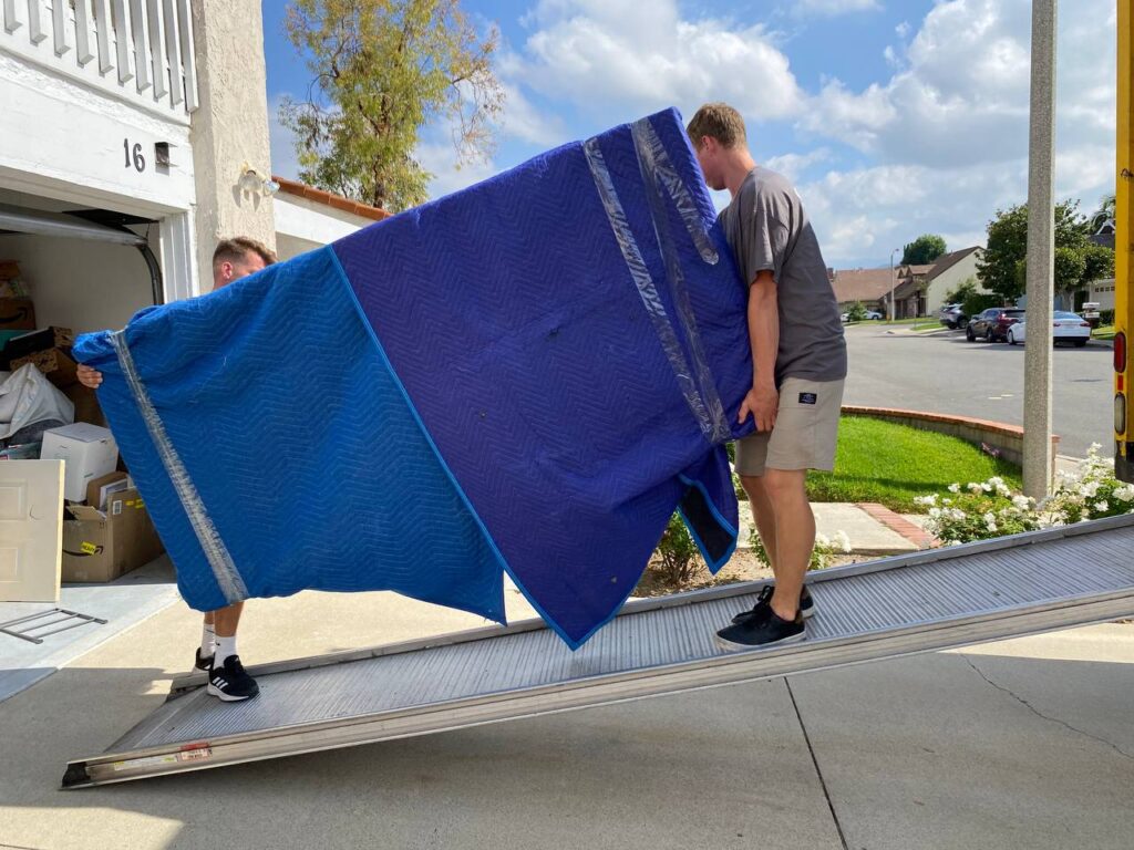 picture of qshark moving professionals loading a truck