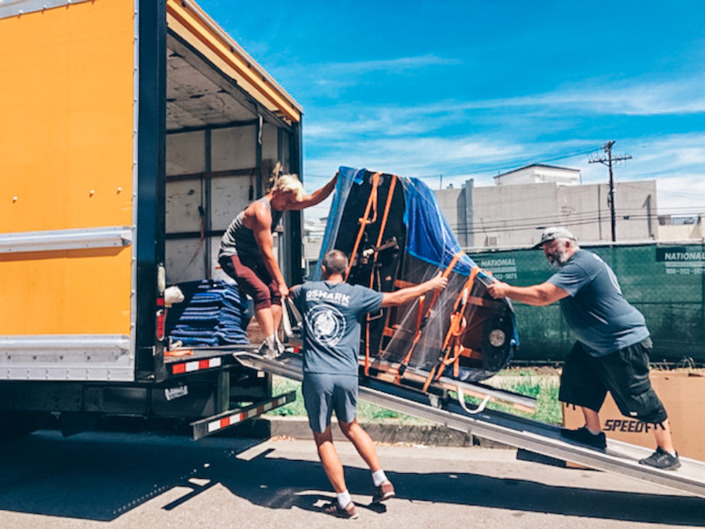 Qshark Movers in Orange County are moving piano, also protect it to make sure nothgin is damaged. This show you how to move oversized item
