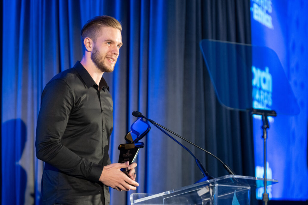 Our CEO giving a speech during the ceremony during Better Business Bureau Torch Award