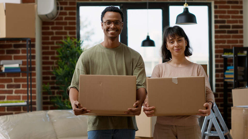 A happy couple getting ready to move with our moving and packing tips