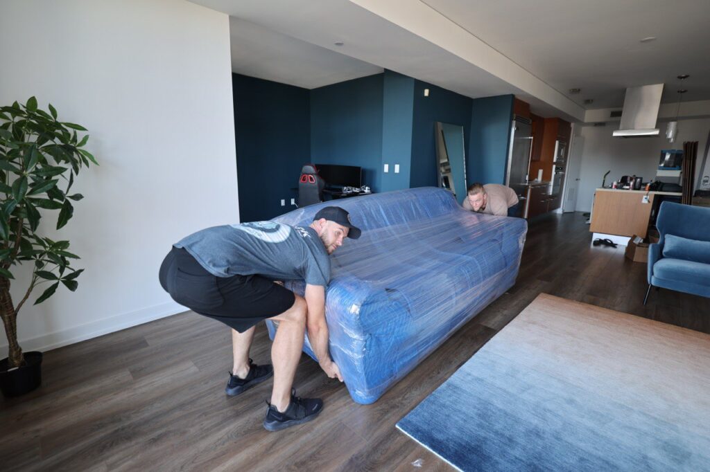 movers moving a couch