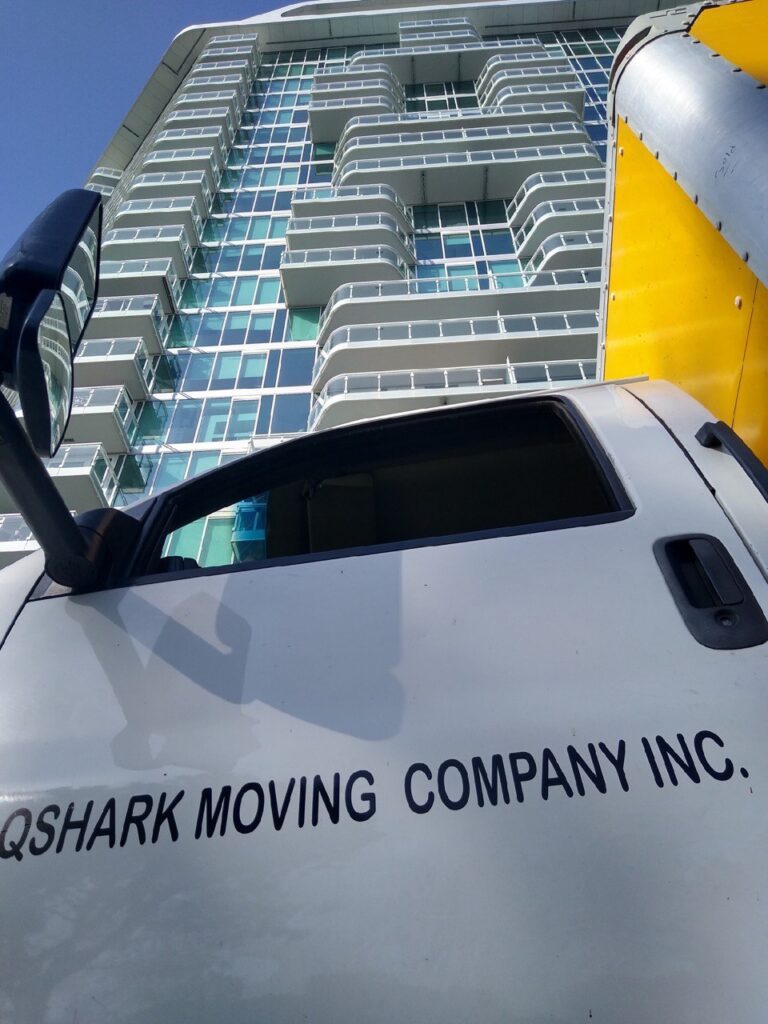 a picture of qshark moving truck, what to do while movers are moving your stuff