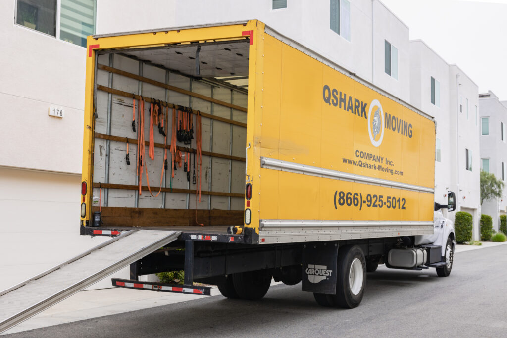 a picture of qshark moving truck ready to help you move