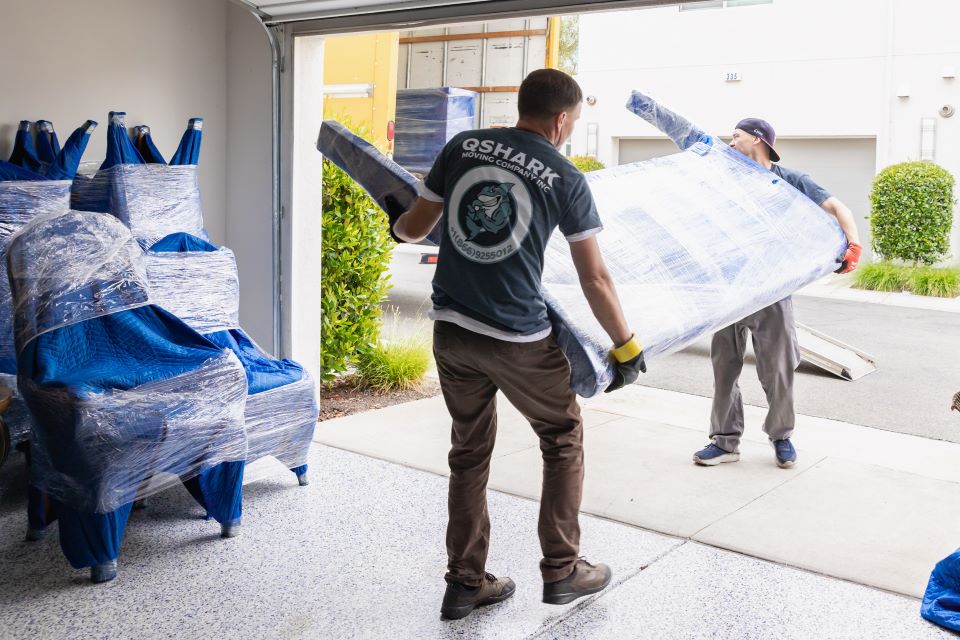 a picture of qshark movers helping move to san diego