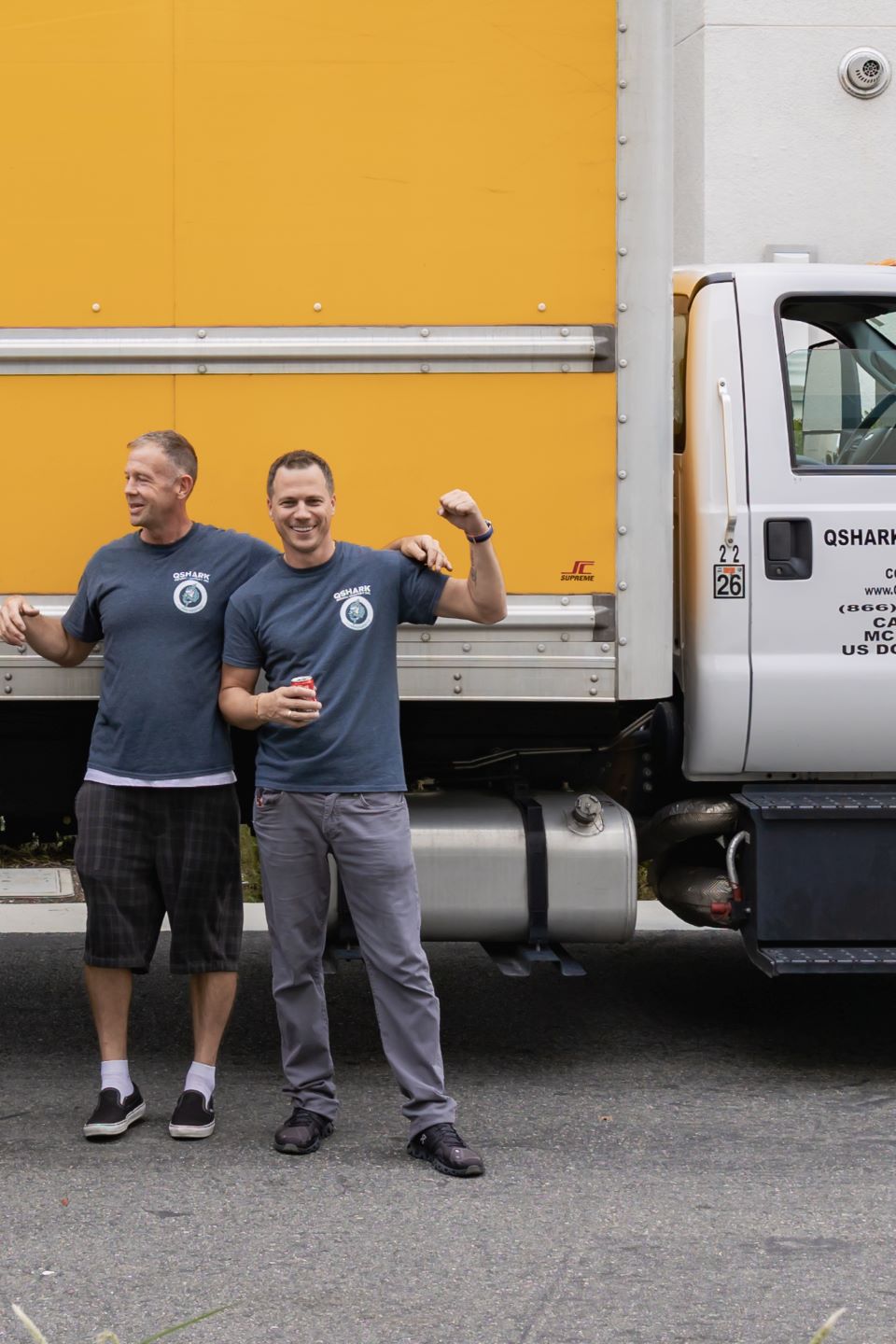 qshark movers san francisco standing next to our truck