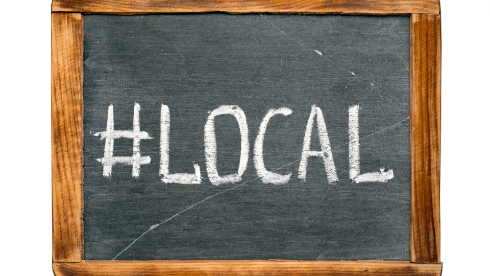 a picture of a sign saying #local