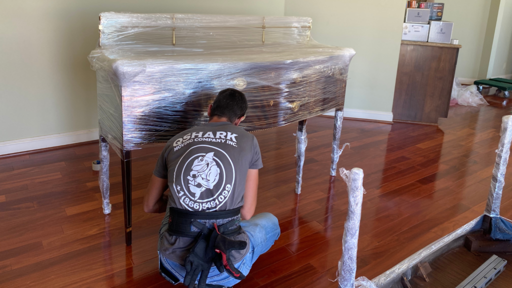 qshark san diego movers wrapping a table