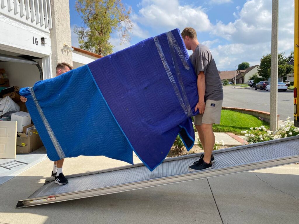 picture of qshark moving professionals loading a truck