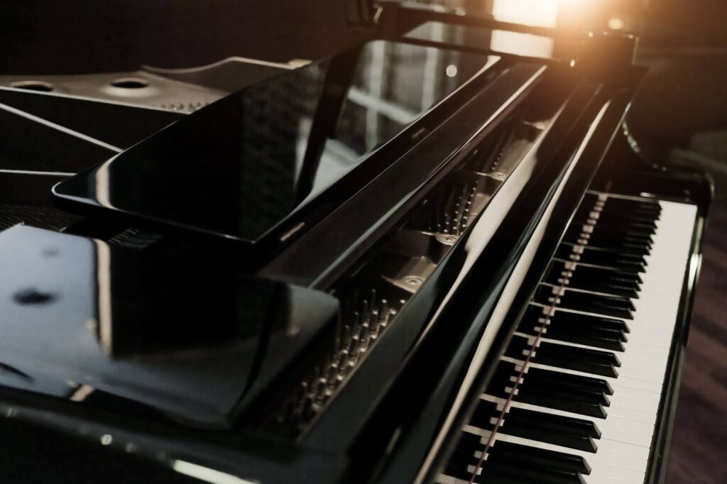 A shiny black grand piano